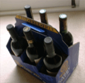 Cardboard carriers  to bring home glasses and wine